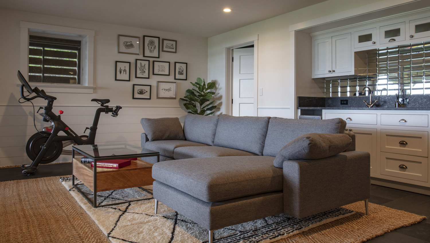 Water Hole blue door welcomes you. Build by Bruce Helier Builders.