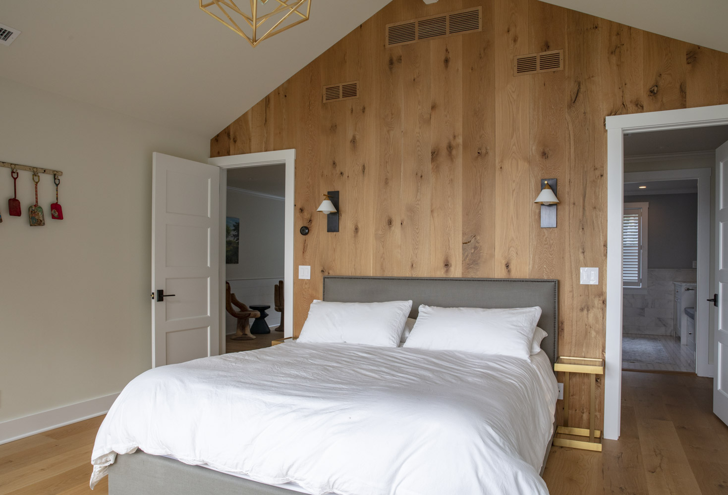 Water Hole blue door welcomes you. Build by Bruce Helier Builders.