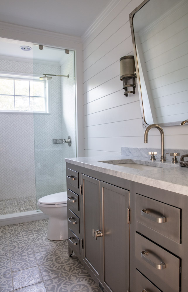 Water Hole blue door welcomes you. Build by Bruce Helier Builders.