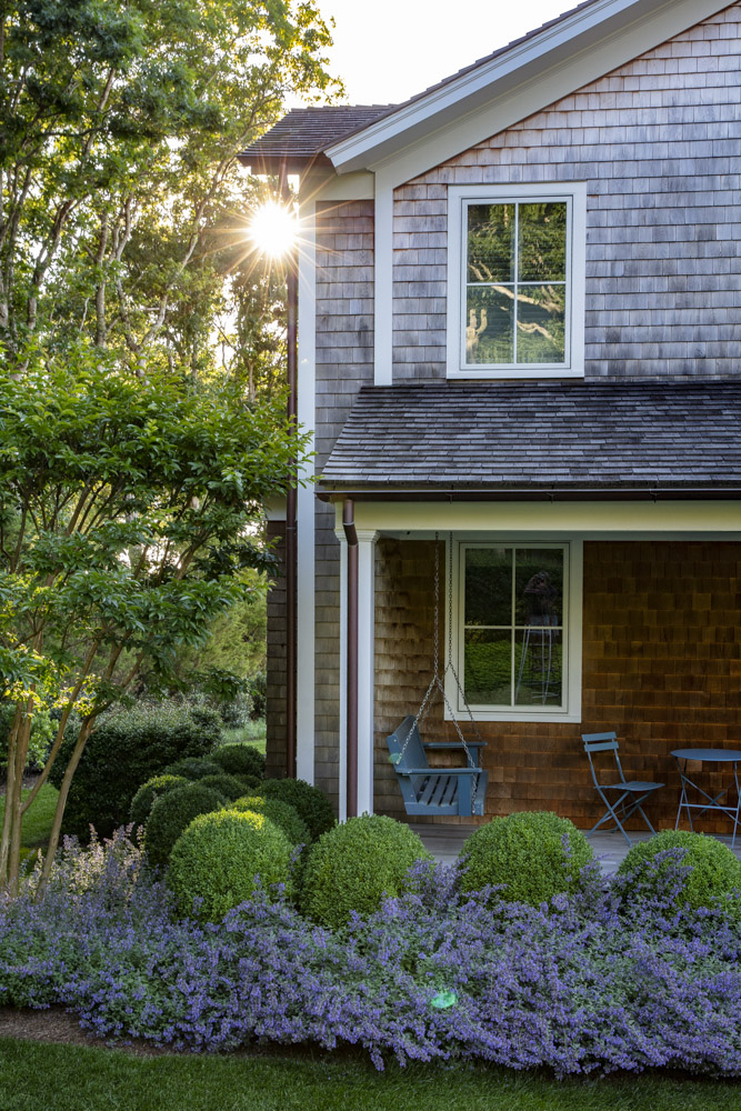 Water Hole blue door welcomes you. Build by Bruce Helier Builders.